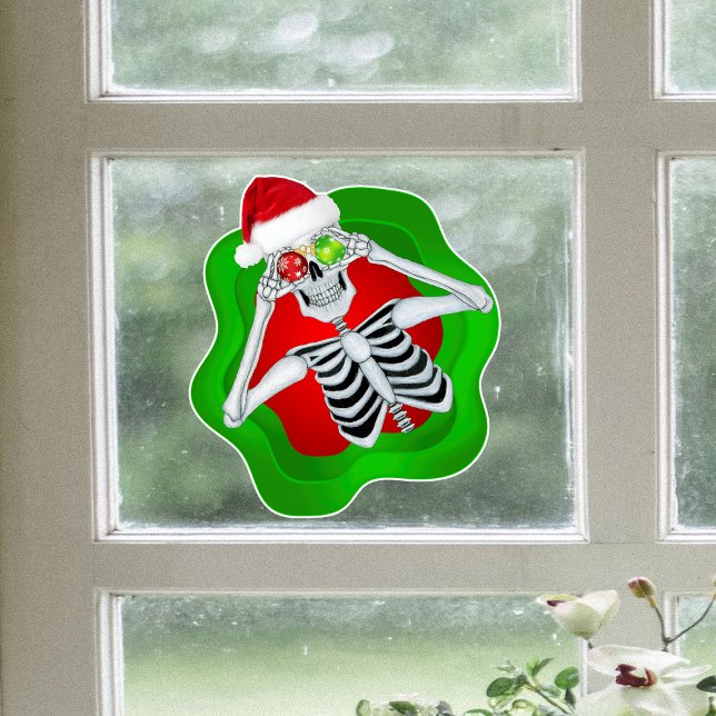 Fun Christmas Skeleton In Splatter Shape Ornaments Window Cling (Fun skeleton Santa Hat holding ornaments in green red spatter on window cling Christmas Decoration.)