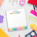 Fun Colored Pencils Note From School Teacher<br><div class="desc">A note from School Teacher notepad personalized with the teacher's name above colorful bunting banners and a row of colored pencils, some with patterns, in soft rainbow colors. Kindergarten teacher notepad with colorful pencils and a bunting flag banner in soft shades of the rainbow, with some patterns like stripes, dots,...</div>