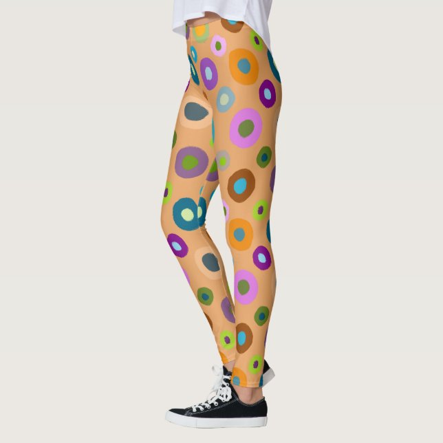 Fun leggings all over colorful dots on orange (Left)