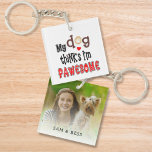 Fun My Dog Thinks I’m Pawesome Photo Name Keychain<br><div class="desc">Fun My Dog Thinks I’m Pawesome Artsy Text Name. Humorous play on words dog humor with the pun My Dog Thinks I’m Pawesome, for Awesome, with quirky lettering with cute paw print motifs. Great gift for your pooch loving friends - and you can personalise with their names and add a...</div>