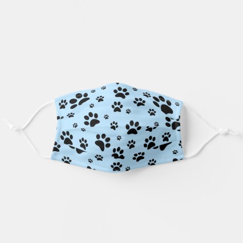 Fun Scattered Black Paw Prints on Light Baby Blue Adult Cloth Face Mask