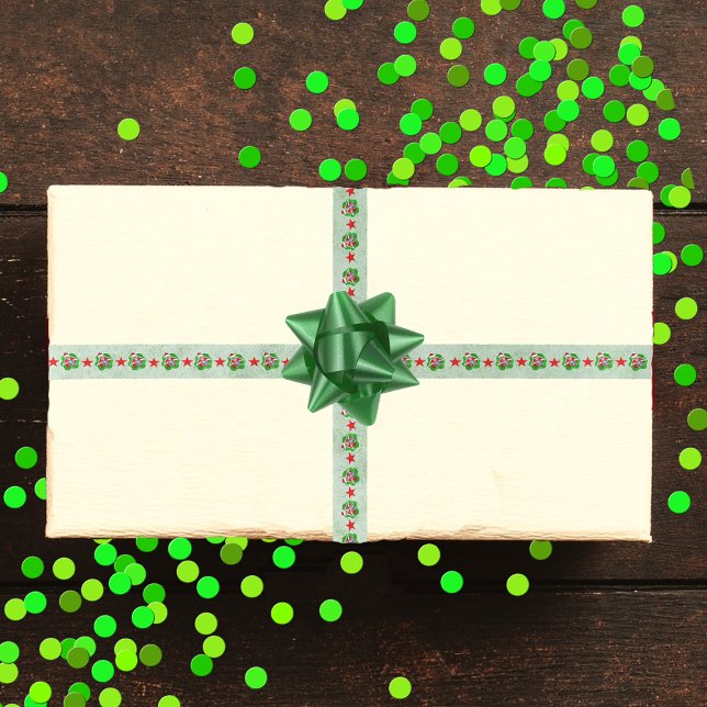 Fun Skeletons Santa Hats in Wavy Circles Green Satin Ribbon (Fun Skeletons Ornament eyes in wavy circles with red stars on light green Christmas wrapping ribbon.)