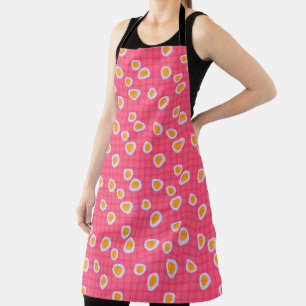 Fun spots on a coral pink checkered background apron