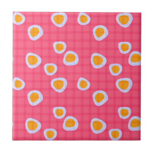 Fun spots on a coral pink checkered background ceramic tile