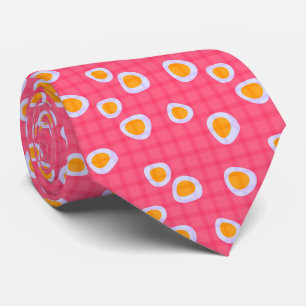 Fun spots on a coral pink checkered background neck tie