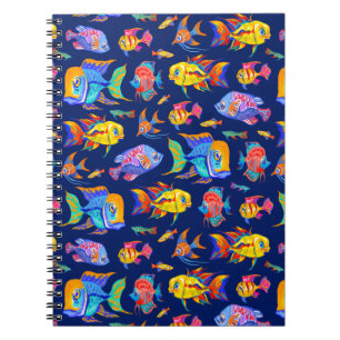 Fun tropical fishes on dark blue notebook