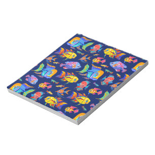 Fun tropical fishes on dark blue notepad