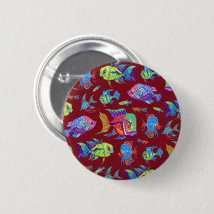 Fun tropical fishes on dark red button