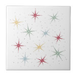 Funky Atomic Starbursts Mid Century 1950s Ceramic Tile<br><div class="desc">Funky up your tiling project with this fabulous atomic era starburst mid century ceramic tile. This design features starbursts in red,  blue,  green,  and yellow and accented with black dots.</div>