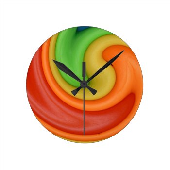 Funky Red Orange Yellow & Green Swirly Round Clock by RetroZone at Zazzle