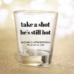 Funny 40th Birthday Shot Glass<br><div class="desc">Funny shot glasses for his 40th birthday party. "take a shot he's still hot" is in a large bold trendy typography and his name and birthday are in simple modern typography.</div>