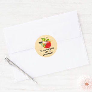 Funny apple and worm education pun art classic round sticker