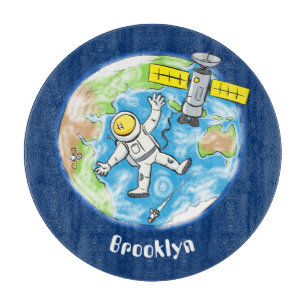 Funny astronaut in space and earth cartoon cutting board