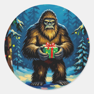 Funny Bigfoot holding a Christmas Gift Classic Round Sticker