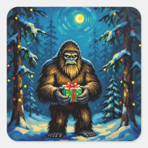 Funny Bigfoot holding a Christmas Gift Square Sticker