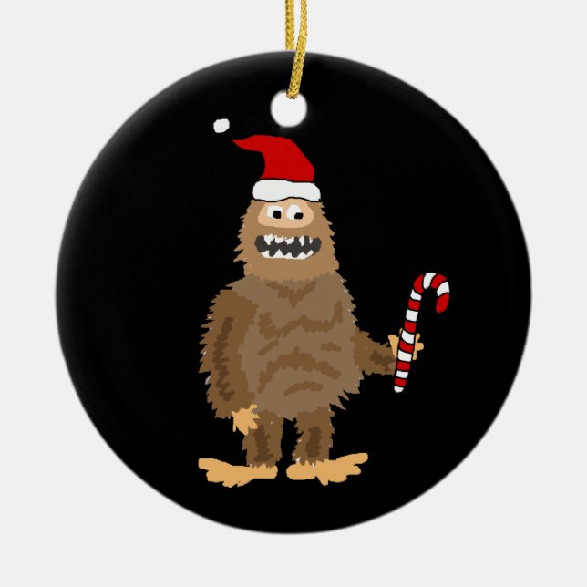 Funny Bigfoot in Santa hat Christmas Cartoon Ceramic Ornament (Front)