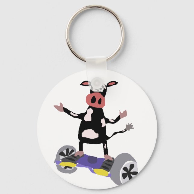 Funny Black and White Cow on Hoverboard Keychain (Front)