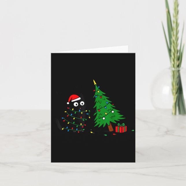 Funny Black Cat Pushing 67 Christmas Tree Over Cat Card (Front)