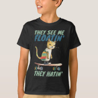 Funny calico cat street skate boarding they hatin