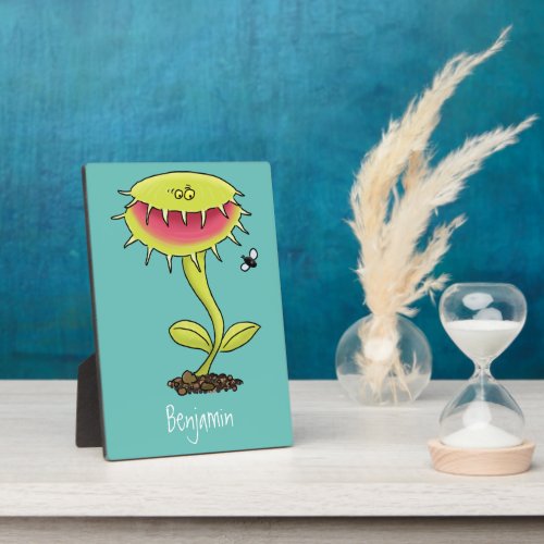 Funny carnivorous Venus fly trap plant cartoon Plaque