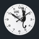 Funny Cat Hang in There Humorous Round Clock<br><div class="desc">A humorous wall clock for the home or office. Black cat hanging on. Makes a cool gift for cat lovers! Check out Jenn’s Doodle World for even more decorative clocks and animal themed home decor.</div>