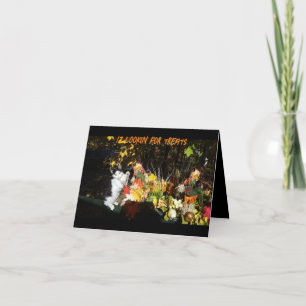 Funny cat in fall foliage Happy Halloween Holiday Card