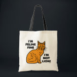 Funny Cat Pun Orange Feline Fine Kitty Tote Bag<br><div class="desc">This cute cat pun tote bag shows a cartoon image of an orange kitty and the original, punny phrase, "I'm Feline Fine. I'm Not Lion!" It's the perfect humorous design for the cat lover or crazy cat lady (or gentleman) in your life. It's also available in our store on other...</div>