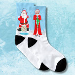 Funny Christmas Couple Fishing Santa & Mrs. Claus  Socks<br><div class="desc">Featuring Santa’s fishing escapade taking a hilarious turn as Mrs. Claus outsmarts him,  these playful socks celebrate the fun and friendly rivalry of ice fishing.</div>