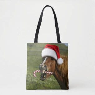 Funny Christmas horse with Santa hat smiling Tote Bag