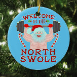 Funny Christmas Santa Claus Swole Weightlifter Ceramic Ornament<br><div class="desc">You won't find Santa Claus messing around with the cookies anymore. This year, he's lifting weights instead of glasses of milk. This funny holiday design shows a buff, shirtless Santa lifting a barbell in his gloved hands. He's surrounded by mistletoe and candy canes, and the text says "Welcome to the...</div>