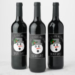 Funny Christmas Snowman Meltdown Drink Fast Wine Label<br><div class="desc">Funny Christmas Snowman Meltdown Drink Fast Wine Labels can add some laughter and humor to your holiday parties! Labels are designed with black customizable background and a snowman surprised face on the center. He has on a hat with green and red holly berries. The funny phrase is "about to have...</div>