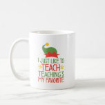 Funny Christmas Teacher Saying | Teacher Elf Coffee Mug<br><div class="desc">I just like to teach teaching's my favorite Christmas mug for teachers! The design features a cute elf hat combined with simple typography. ©TeacherTribeMerch</div>