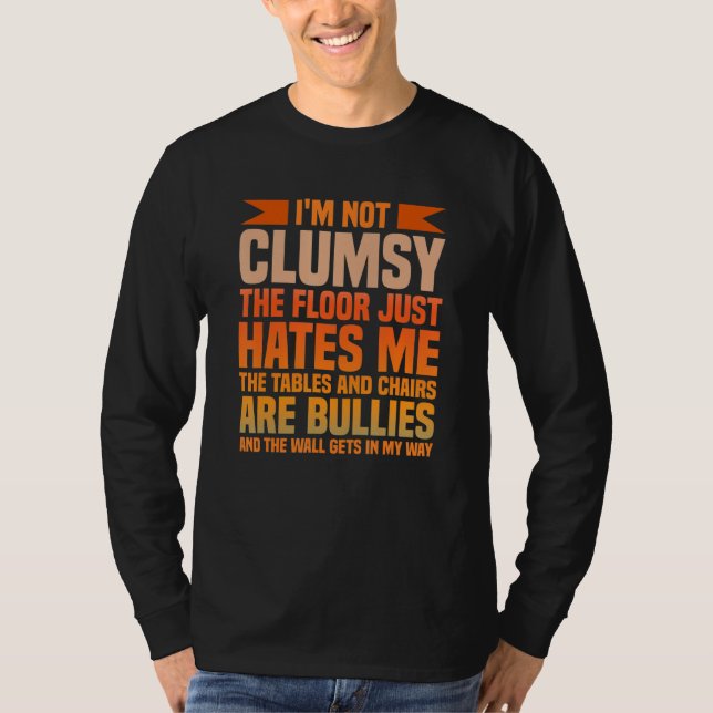 Funny Clumsy-I'm Not Clumsy The Floor Just Hates M T-Shirt (Front)