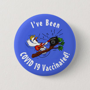 Funny cockatoo playing rock guitar cartoon button