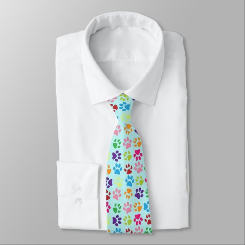 Funny Colorful pet dog or cat paw prints on blue Neck Tie
