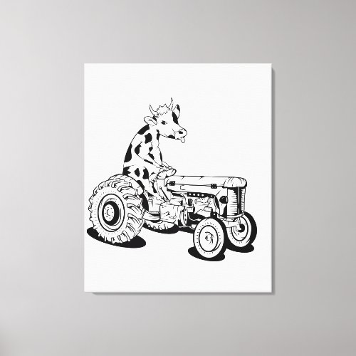 Funny cow on a tractor canvas print