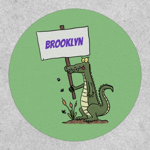 Funny crocodile aligator with sign cartoon patch