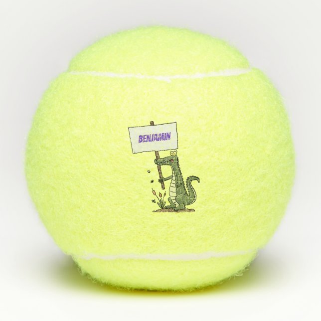 Funny crocodile aligator with sign cartoon tennis balls (Front)