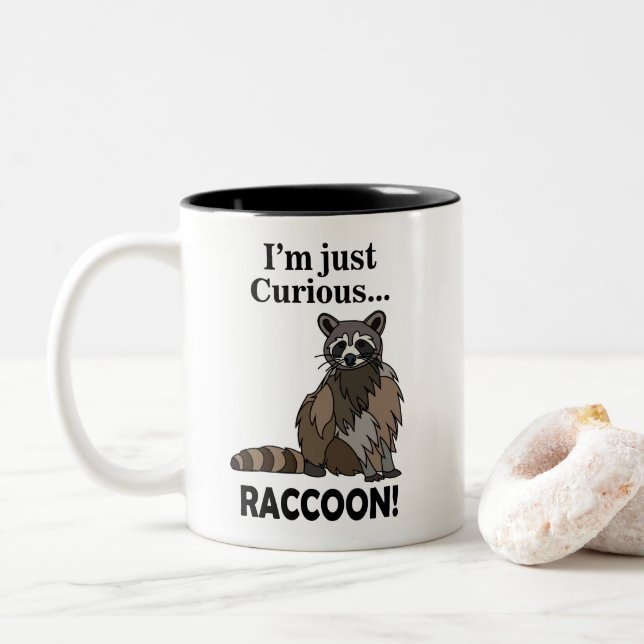 Funny Curious Raccoon Two-Tone Coffee Mug (With Donut)