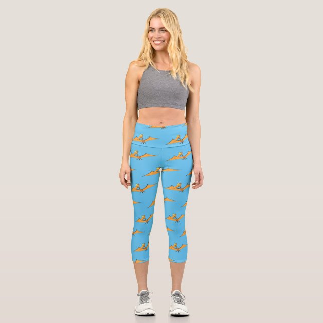 Funny cute orange flying pterodactyl cartoon capri leggings (Front)