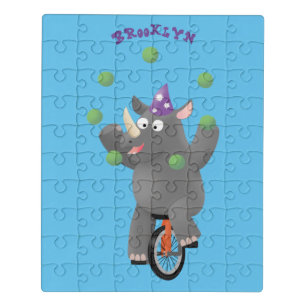 Funny cute rhino juggling on jigsaw puzzle