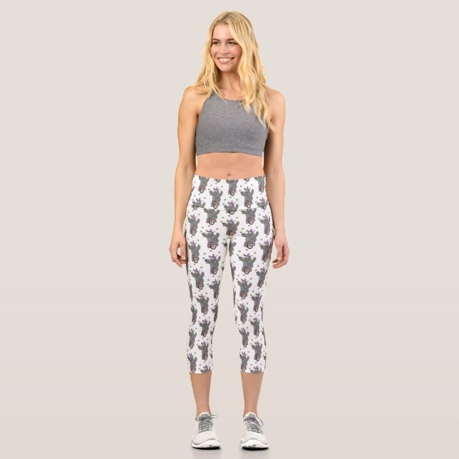 Funny cute rhino juggling on unicycle capri leggings (Front)
