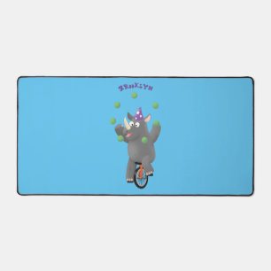 Funny cute rhino juggling on unicycle desk mat
