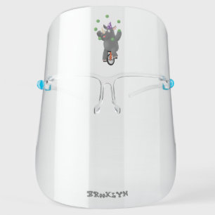 Funny cute rhino juggling on unicycle face shield