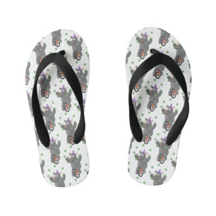 Funny cute rhino juggling on unicycle kid's flip flops