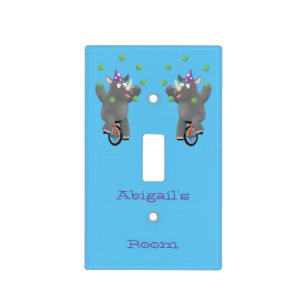 Funny cute rhino juggling on unicycle light switch cover
