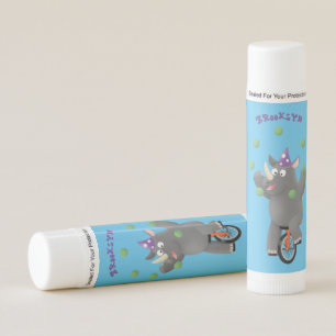 Funny cute rhino juggling on unicycle lip balm