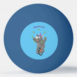 Funny cute rhino juggling on unicycle ping pong ball
