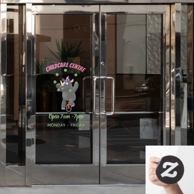 Funny cute rhino juggling on unicycle window cling (Office Door)