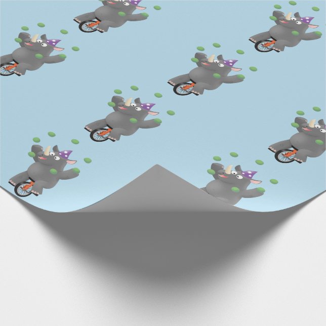 Funny cute rhino juggling on unicycle  wrapping paper (Corner)